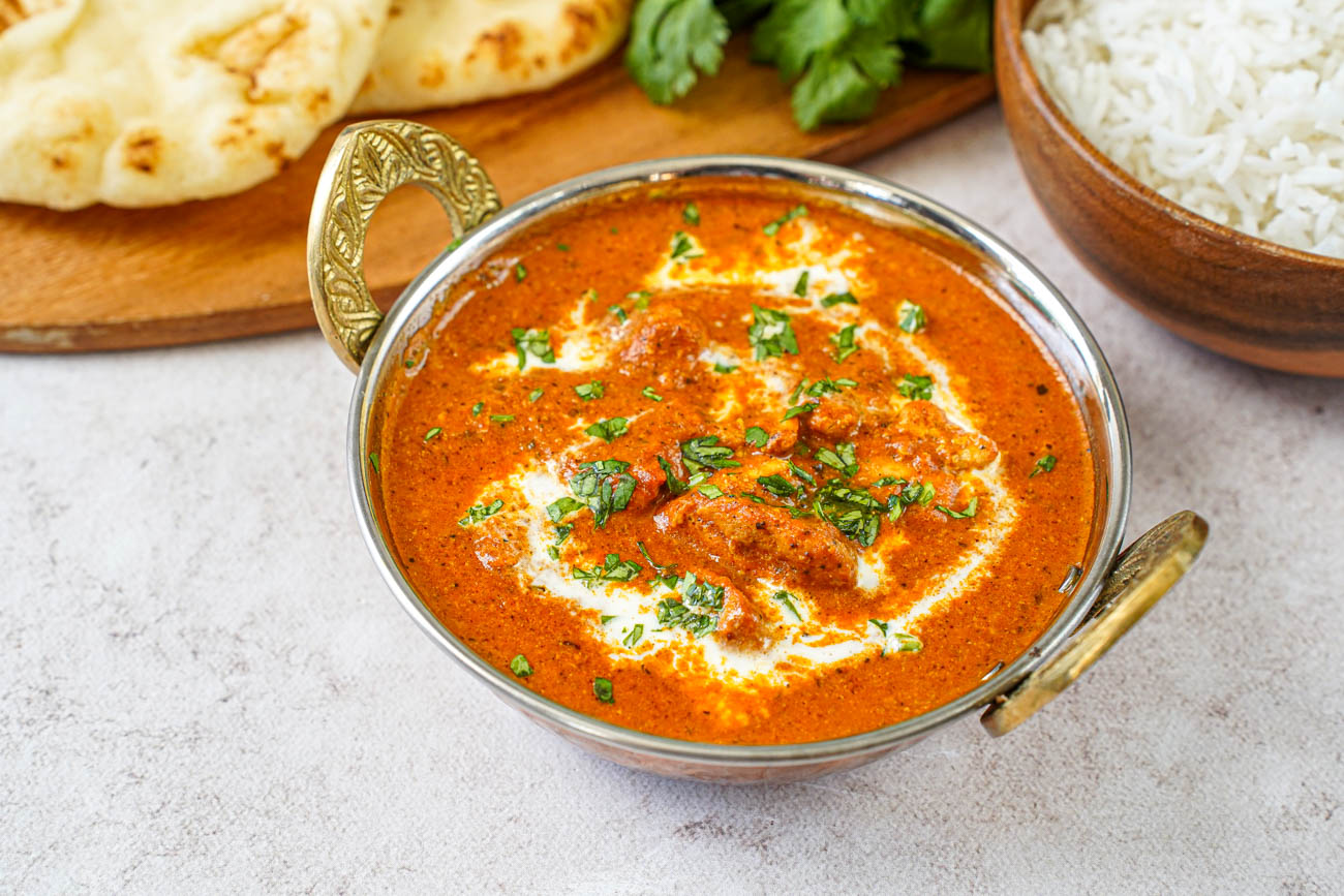 Butter Chicken (Murgh Makhani) - Signature dish at Gorkha Restaurant Portugal